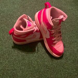Pink mid top Nike sneakers 1’s